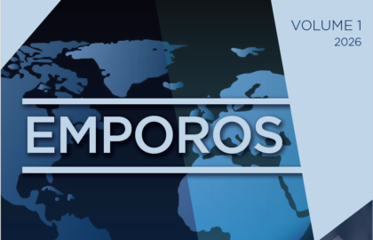 A stylized world map in blue tones with the word "EMPOROS" in bold letters and "VOLUME 1 2026" in the top right corner.